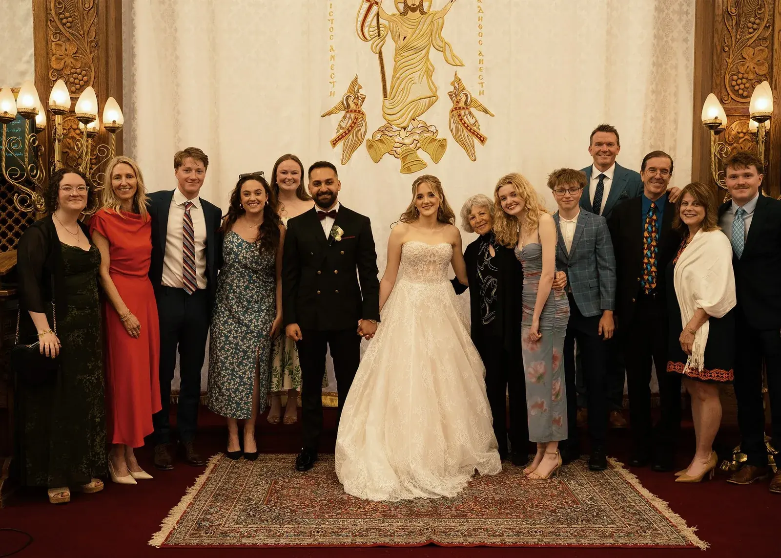 Family group portrait indoors at a formal event