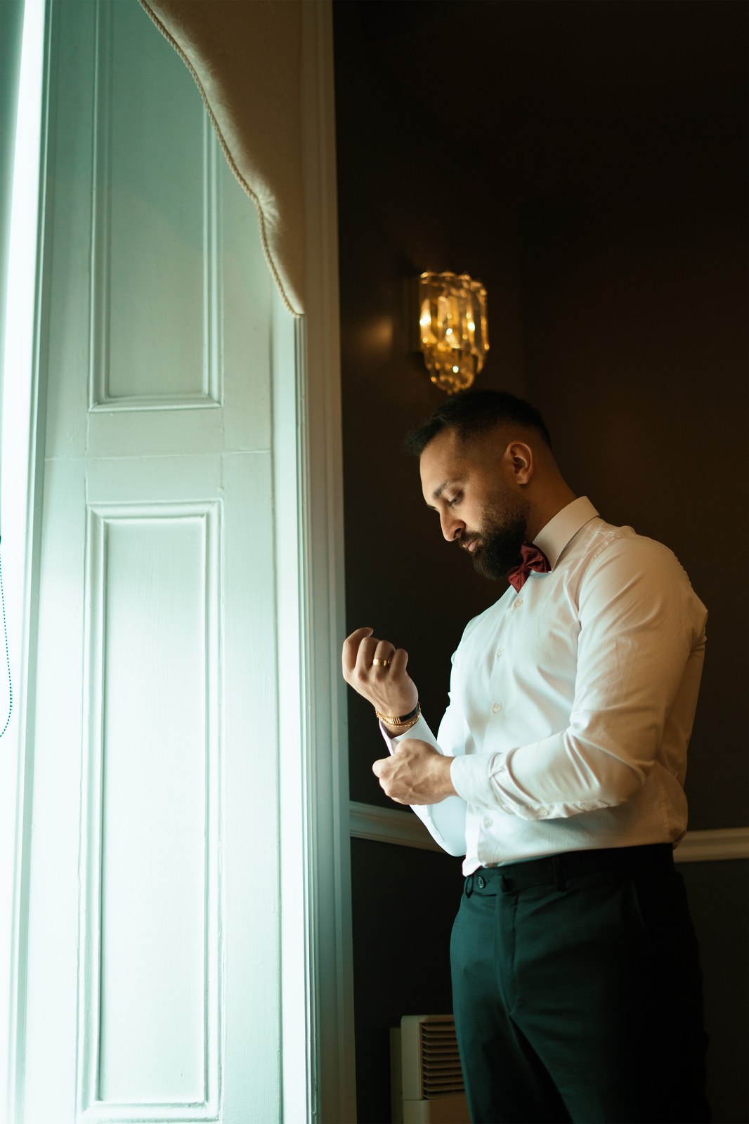 Professional portrait in an elegant venue doorway