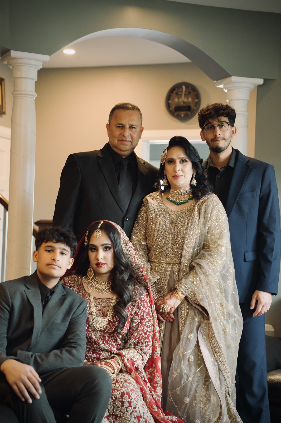 Multi-generational family portrait indoors