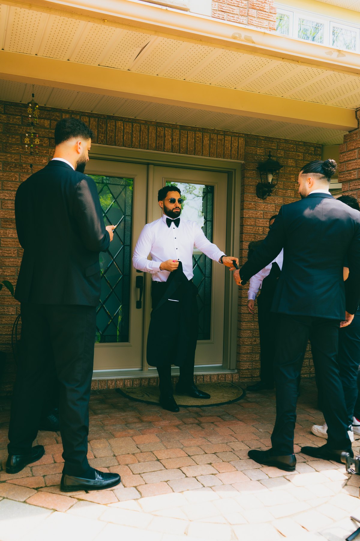 Groom and groomsmen getting ready before the ceremony