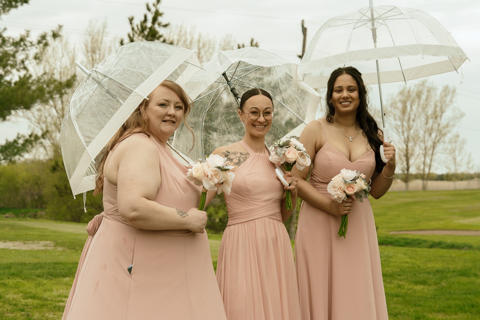 Family group standing side by side outdoors